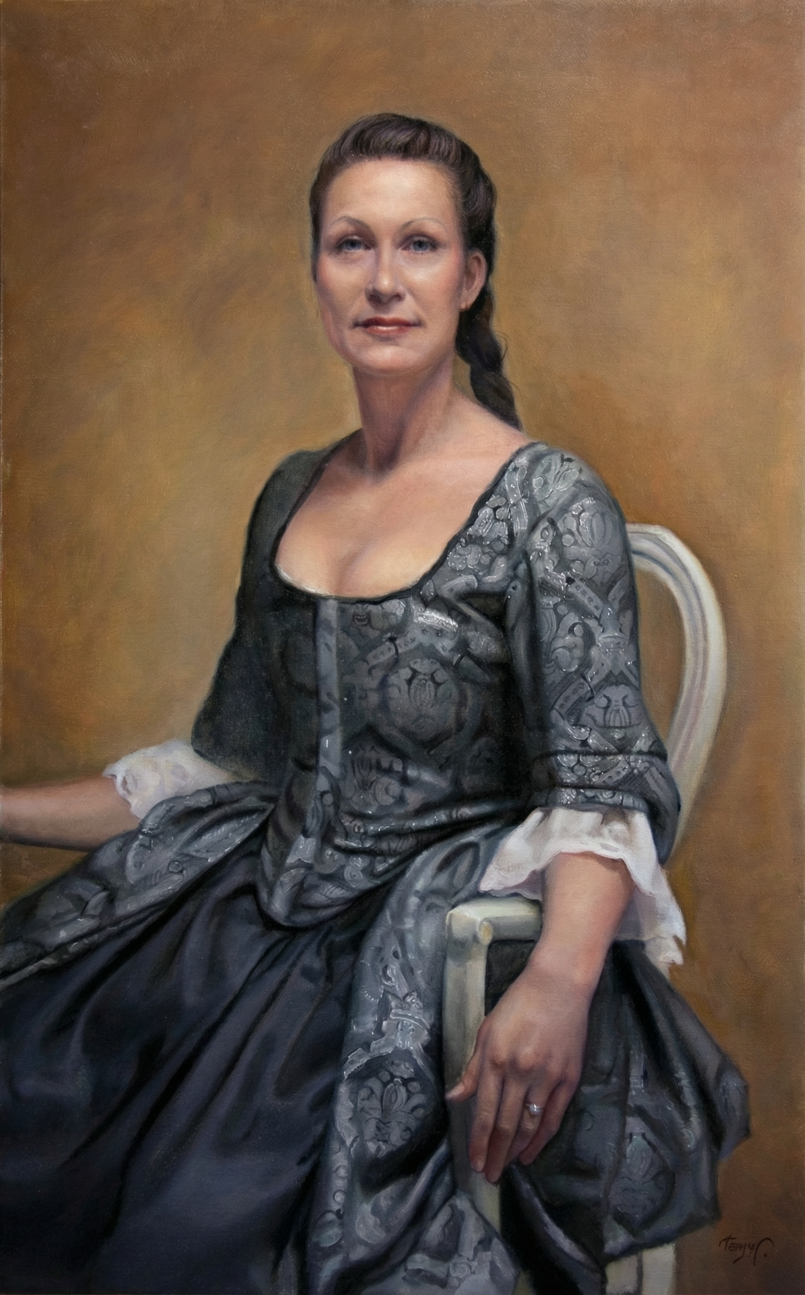 Seated Woman in Grey Dress